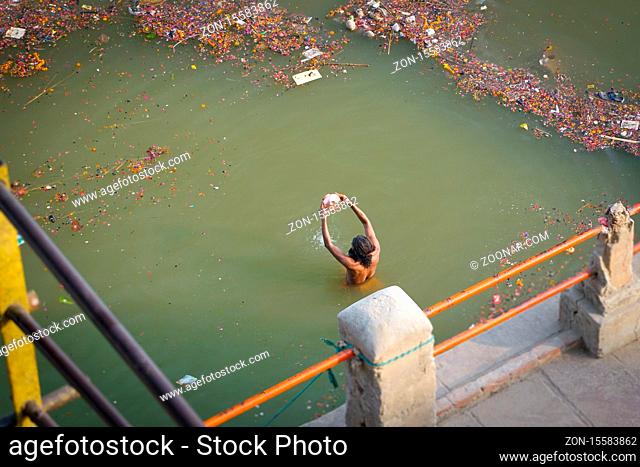 Varanasi/India-13.07.2019:The indian man washing in Varanasi