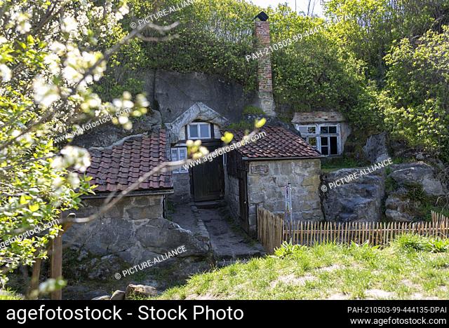 28 April 2021, Saxony-Anhalt, Halberstadt: This cave dwelling is located on the Schäferberg. It is reminiscent of the Shire from the bestseller Lord of the...