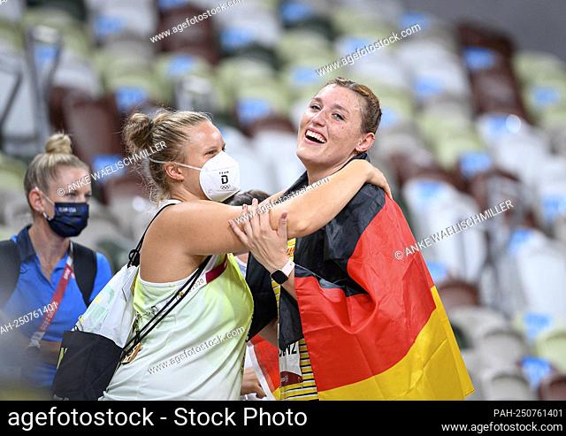 jubilation Kristin PUDENZ (GER / 2nd place) with flag, is hugged by Sara GAMBETTA (shot put). Athletics, Women's Discus Throw Final, Women's Discus Throw Final