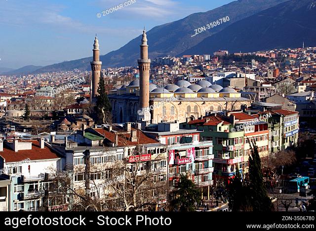 Minaret and dome of Eski Jami and houses in Bursa