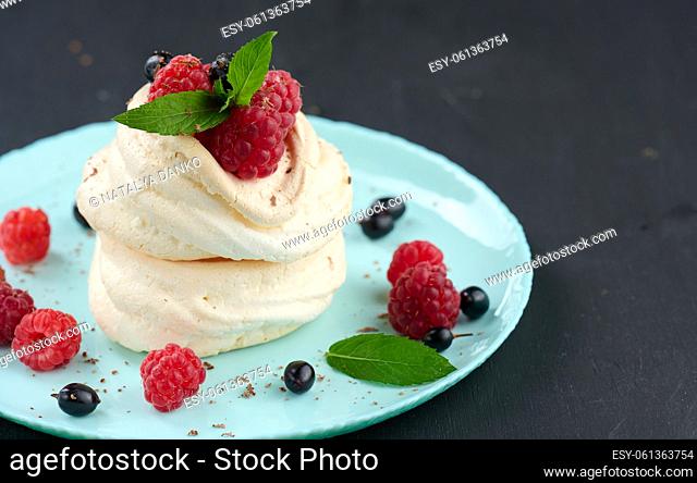 Baked cake made from whipped chicken protein and cream, decorated with fresh berries