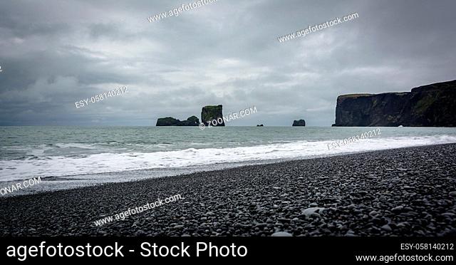 Stormy weather on the Kirkjufjara beach. Located in the south coast of Iceland, Europe