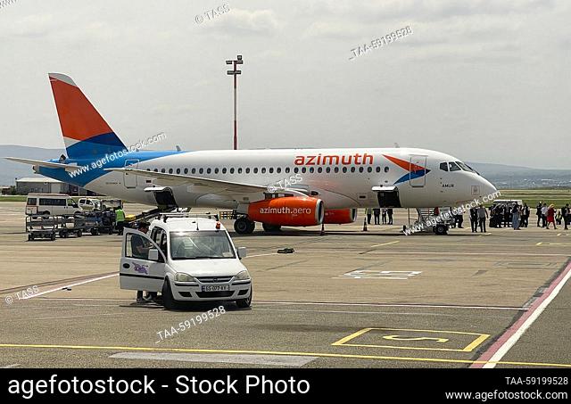 GEORGIA, TBILISI - MAY 19, 2023: An Azimuth flight arrives from Moscow at Shota Rustaveli Tbilisi International Airport. On May 10