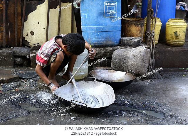 India, 18 February 2016. A child labour work in street shop in Kolkata, Photo by Palash Khan