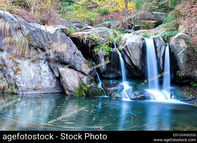 beautiful autumn landscape, black dragon pond waterfall in lushan mountain