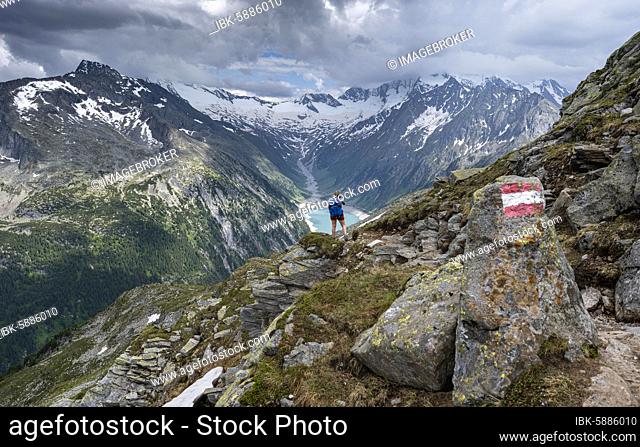 Hiking on the Berlin High Altitude Trail, Schlegeis Reservoir, Schlegeis reservoir, Zillertal Alps, Schlegeiskees Glacier, Zillertal, Tyrol, Austria, Europe