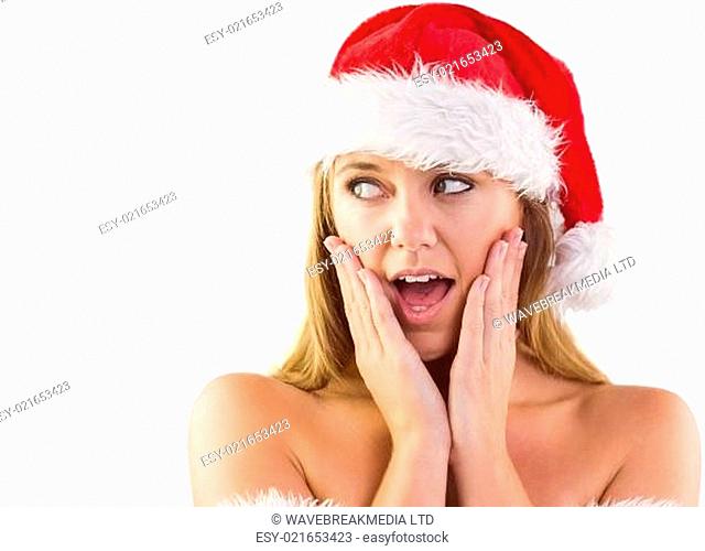 Festive blonde with hands on face