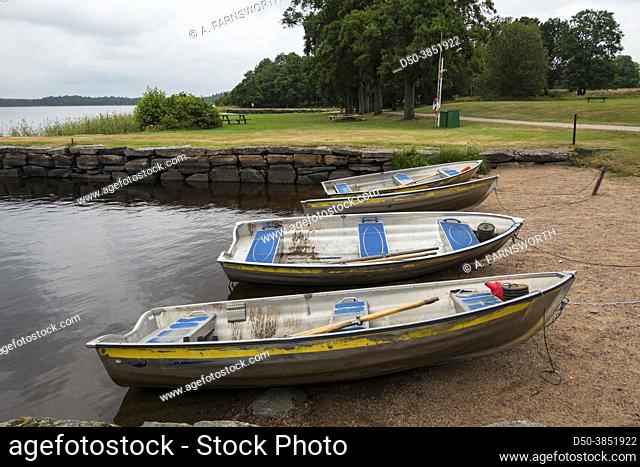 Hofsnas, Sweden Three rowboats parked on a small beach