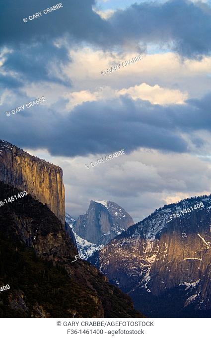 Cumulus clouds in spring over El Capitan and Half Dome, Yosemite Valley, Yosemite National Park, California
