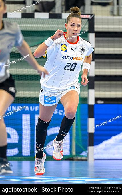 05 March 2023, Baden-Württemberg, Heidelberg: Handball, women: International match, Germany - Poland. Emily Bölk from Germany is happy about a goal