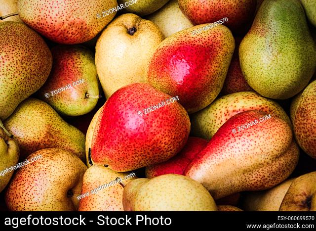 pile of pears on food market - pear background