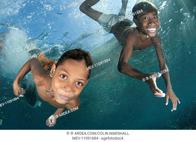Underwater boys playing