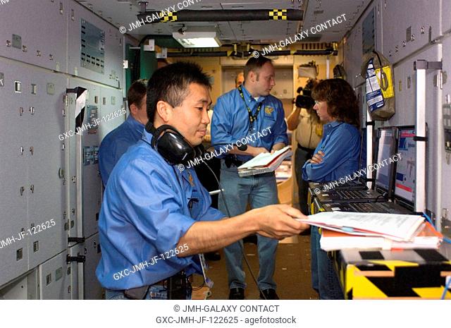 Expedition 18 crewmembers participate in a space station emergency scenarios training session in the Space Vehicle Mockup Facility at NASA's Johnson Space...
