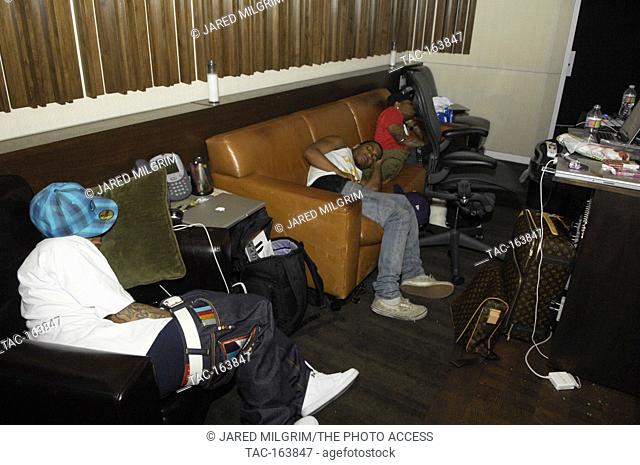 (L-R) Arab, Lil B the Based God and JBar sleeping at a recording studio on February 17, 2010 in Los Angeles, California