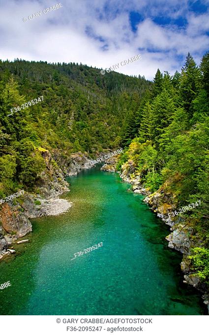 Smith River flowing through forest canyon, Del Norte County, California