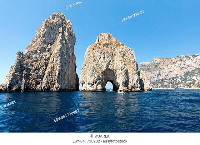 View from the boat on the Faraglioni Rocks on Capri Island, Italy