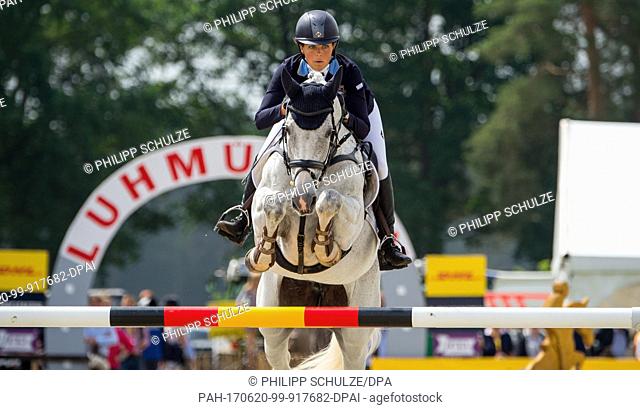 Swedish eventing rider Louise Svensson Jaehde and her horse Waikiki in action during the international four-star eventing competition in Luhmuehlen, Germany