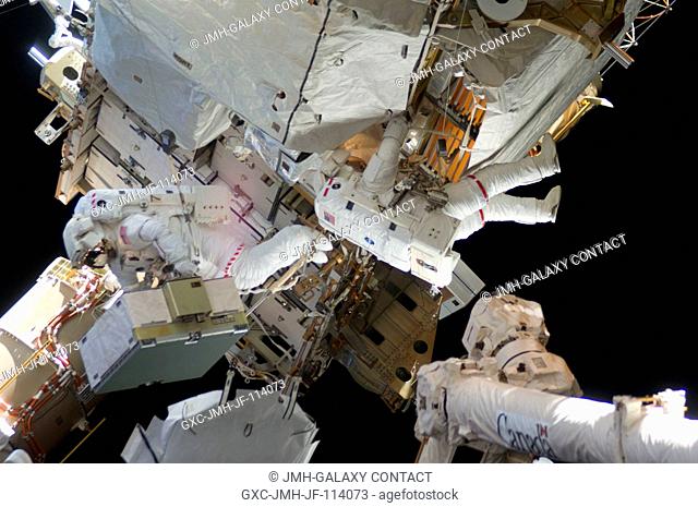 Astronauts Tom Marshburn (left) and Christopher Cassidy, mission specialists for STS-127, share duties on the fourth spacewalk of Endeavour's current mission...