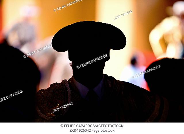Silhouette of a bullfighter's head wearing the traditional hat or 'montera', spain