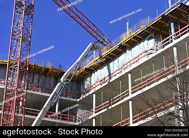 Large construction site of a commercial property, building materials, large construction site, shell, construction industry, new building