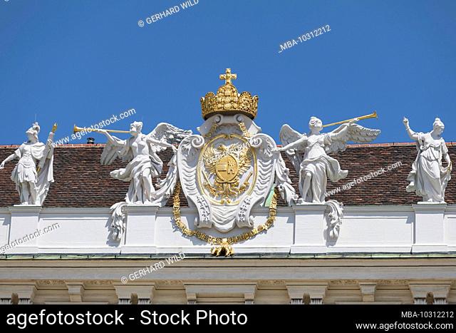 Detailed view of the Hofburg, view from the inner courtyard of the decorations on the roof of the Imperial Chancellery, 1st district, Inner City, Vienna