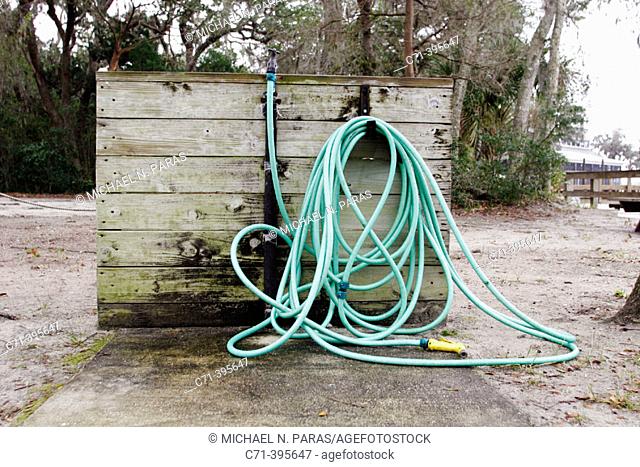 Tangled hose on rack