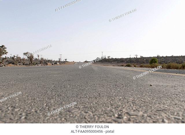 Road through arid landscape