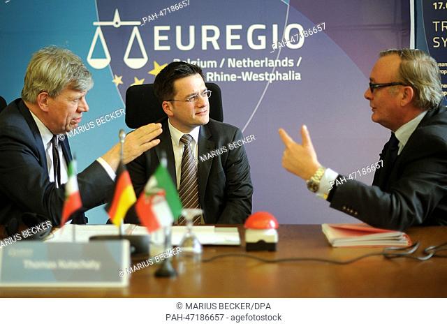 Dutch Minister of Justice Ivo Opstelten (L-R), Thomas Kutschaty (SPD), Justice Minister of the German state of North Rhine-Westphalia and Hubert Cooreman