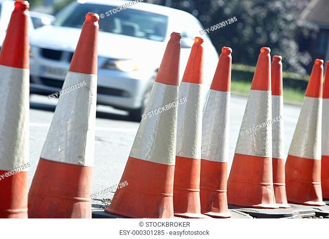 Traffic Cones Lined Up On The Side Of The Road