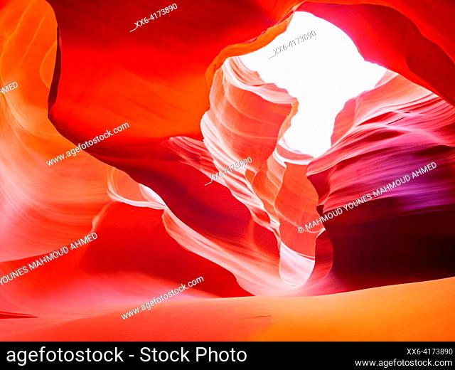 Eroded sandstone and ray of sunlight in Antelope Canyon