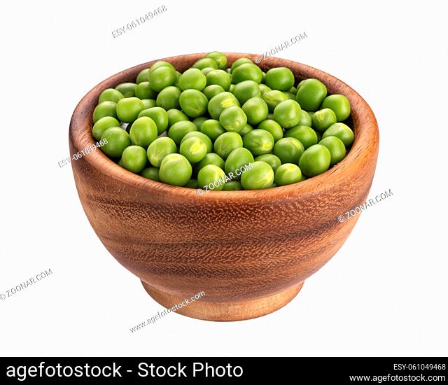 Wooden bowl of green peas isolated on white background with clipping path