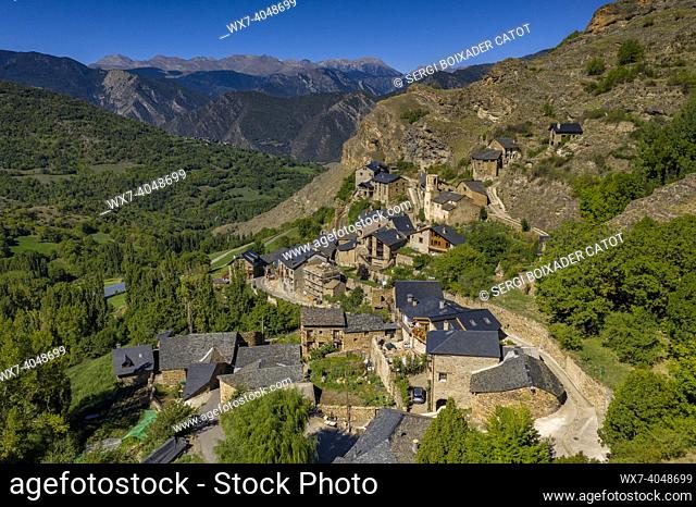 Aerial view of the town of Burg and the surrounding green fields in Coma de Burg (Pallars SobirÃ , Lleida, Catalonia, Spain, Pyrenees)