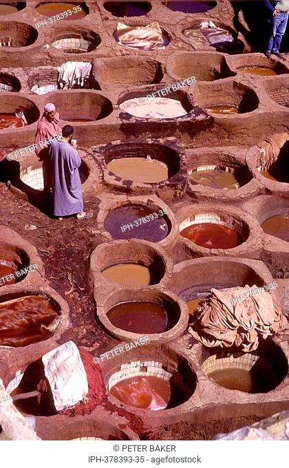 The many coloured pools for dying leather in a tannery set within the Medina of Fez, the forth largest city in Morocco