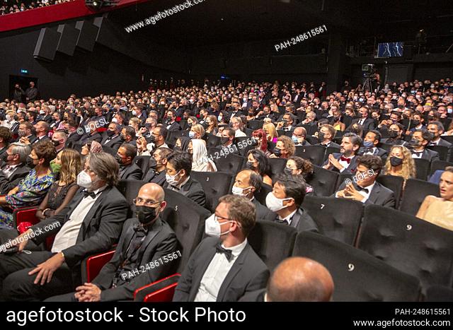 Audience in a full movie theatre seen during the closing ceremony of the 74th Annual Cannes Film Festival at Palais des Festivals in Cannes, France