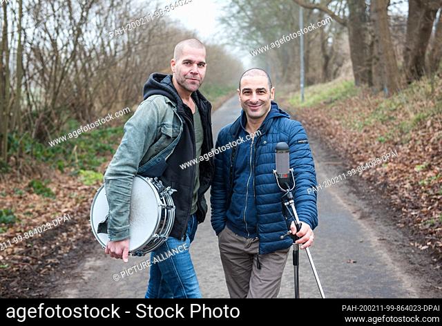 24 January 2020, Schleswig-Holstein, Schenefeld: Volkan Baydar (r) and Vince Bahrdt, both musicians, stand together as the music group Orange Blue with a...