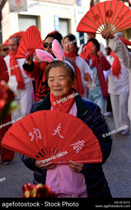 January, 22, 2023, Madrid, Spain, women with headdresses in the shape of rabbit ears for being the year of the rabbit in the Chinese calendar