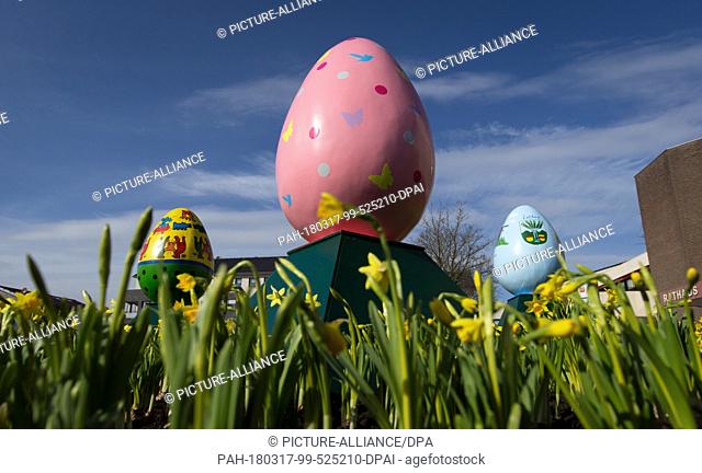 17 March 2018, Germany, Lathen: A 256 squared meter easter nest, with a diameter of 18 meters, basket made up of easter eggs, 7500 plants