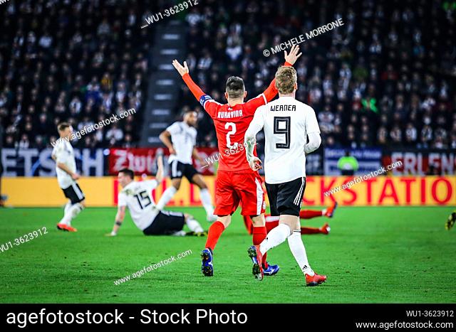 Wolfsburg, Germany, March 20, 2019: Serbian national team captain Antonio Rukavina raises his arms during the international friendly game Germany vs Serbia at...