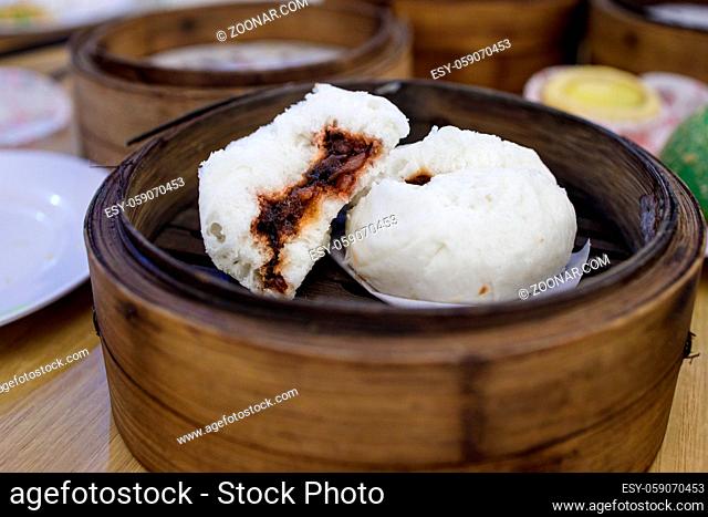 Steamed cantonese styled buns with sweet pork inside