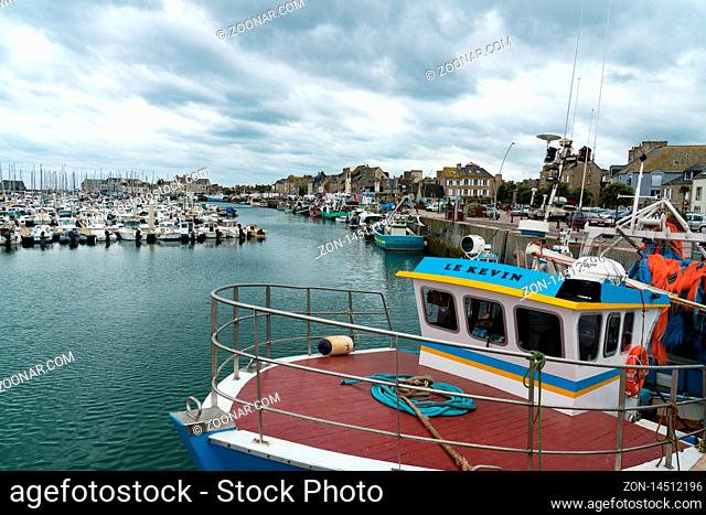 Saint-Vaast-la-Hougue, Manche / France - 16 August, 2019: fishing boats and yacht marina in the harbor of Saint Vaast la Hougue in Normandy