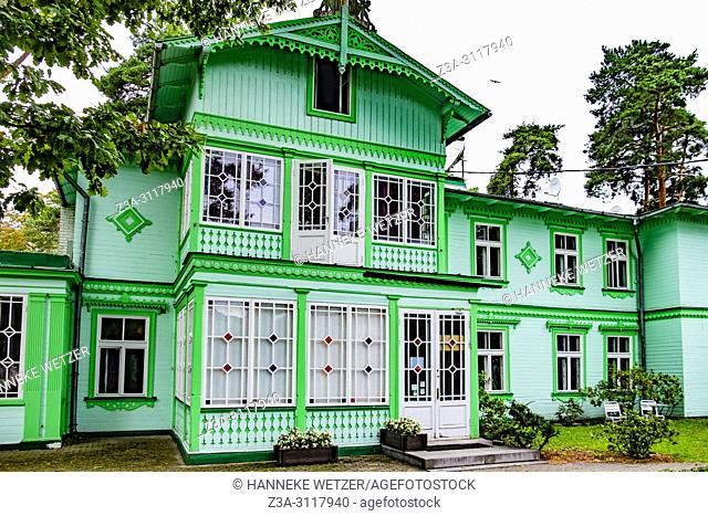 Green wooden house in Jurmala, Latvia, Europe