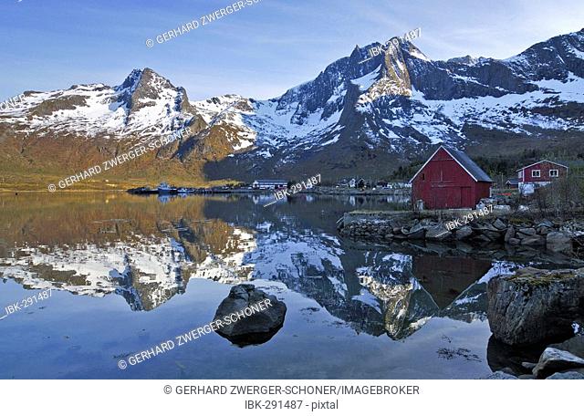 Mountain lake with wooden hut, Austvagoy, Lofoten, Norway, Scandinavia, Europe