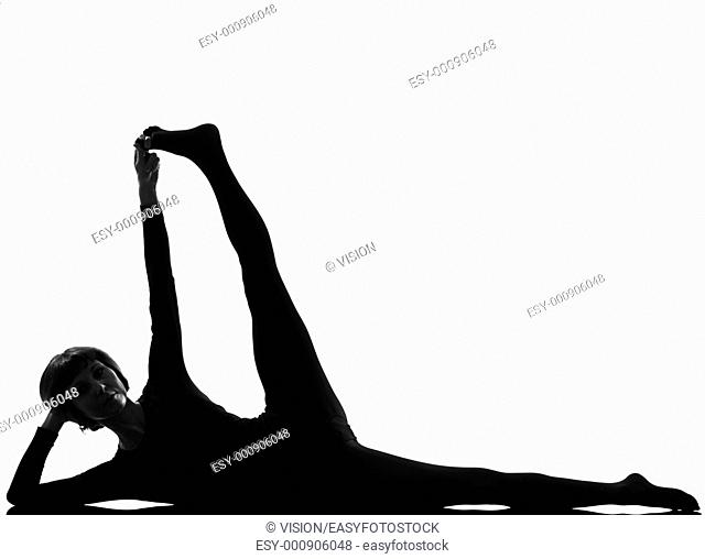 woman Sleeping Vishnu Yoga Pose yoga pose posture position in silouhette on studio white background Side-Reclining Leg Lift