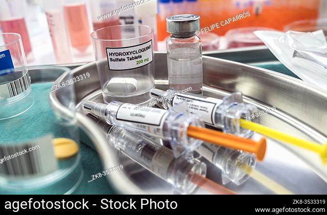 Nurse prepared for people affected by Covid-19, hydroxycloquine is a selective antiviral prophylactic against virus, conceptual image
