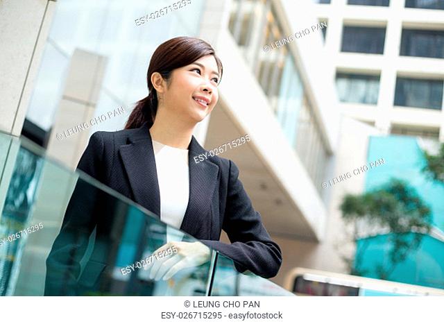 Asian Businesswoman standing at outdoor