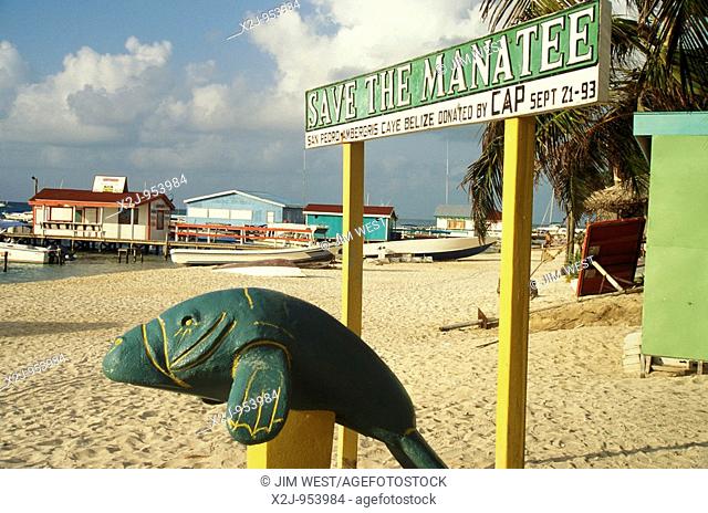 San Pedro, Belize - A sign and the likeness of a manatee on the beach reminds visitors that the manatee is an endangered species  The waters off Belize contain...