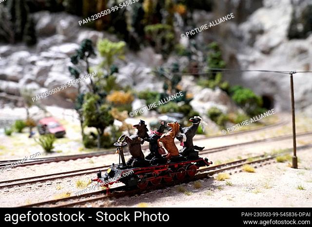 03 May 2023, Hamburg: Horses ride on a small train in the new Patagonia and Argentina section in Miniatur Wunderland. After four years of work on two continents