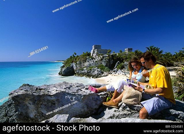 Tourists in front of the Mayan temple, Tulum, Riviera Maya, Yucatan, Mexico, Central America