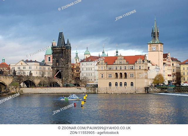 Prague Czech Republic -5 December 2017: Charles Bridge Prague with Police boat