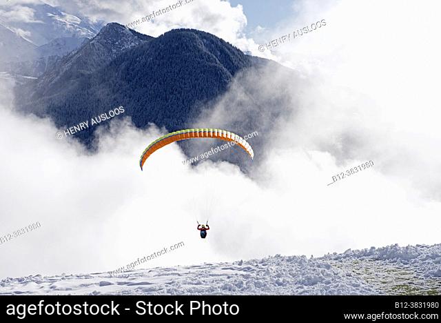 France, Haute Savoie (74), Alps, Passy, Plaine de Joulx, paraglider in winter